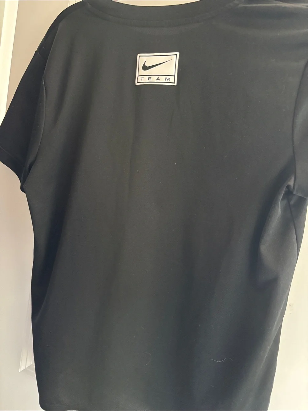 Nike Black Tee with White Outline Logo